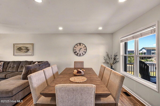 1116 E Beach Dr, Oak Island, NC 28465 - dining room with wood finished floors and recessed lighting