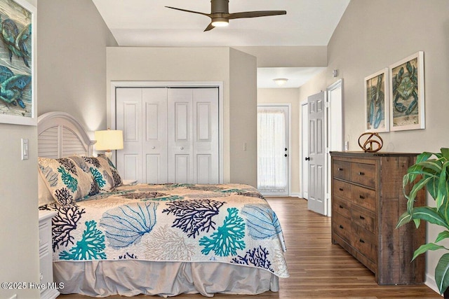 1116 E Beach Dr, Oak Island, NC 28465 - bedroom featuring wood finished floors, a closet, and a ceiling fan