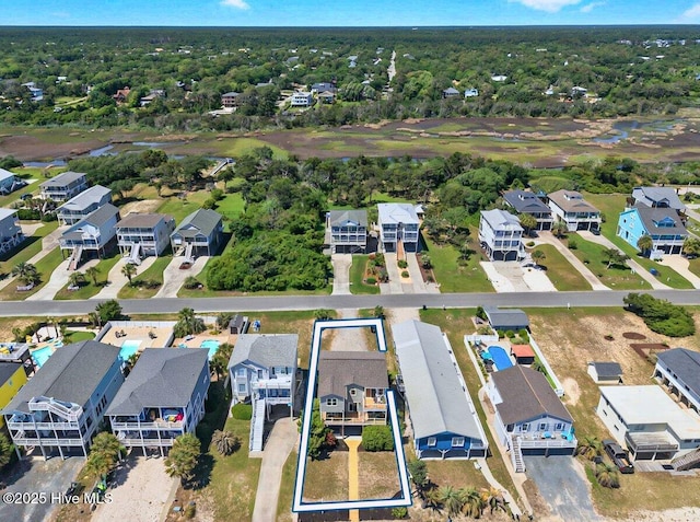 1116 E Beach Dr, Oak Island, NC 28465 - aerial view of property and surrounding area featuring nearby suburban area