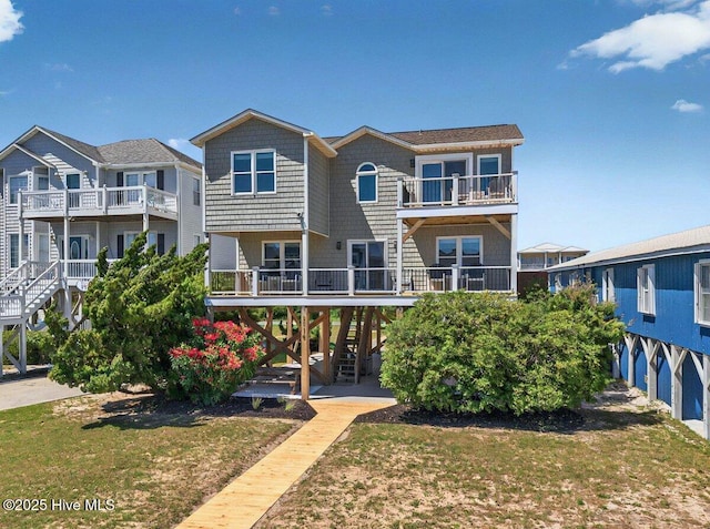 1116 E Beach Dr, Oak Island, NC 28465 - view of front of property with stairs