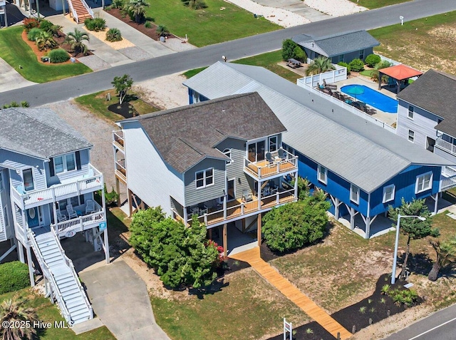 1116 E Beach Dr, Oak Island, NC 28465 - aerial view of property and surrounding area featuring a pool area