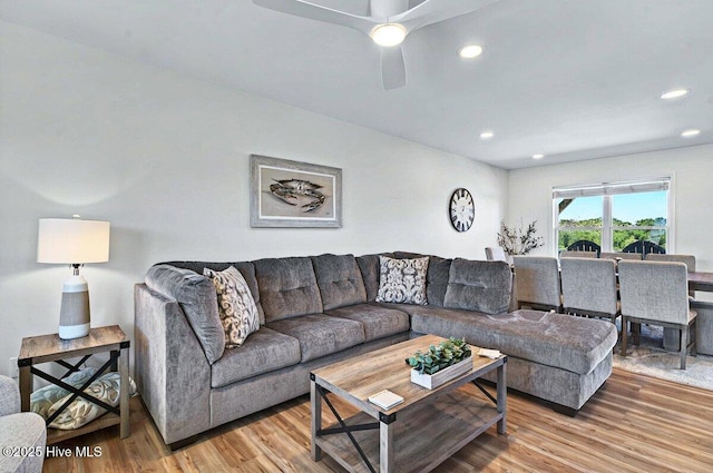 1116 E Beach Dr, Oak Island, NC 28465 - living room featuring light wood-type flooring, recessed lighting, and ceiling fan
