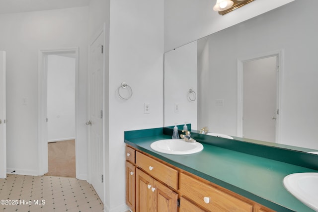 109 Country Club Dr, Rockingham, NC 28379 - full bath featuring double vanity and baseboards