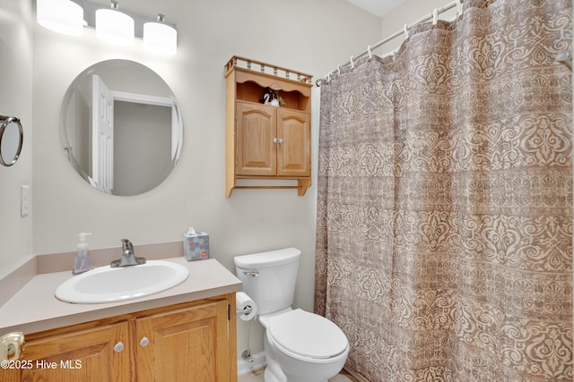 109 Country Club Dr, Rockingham, NC 28379 - bathroom with vanity, toilet, and a shower with shower curtain
