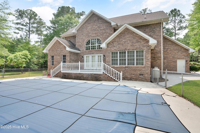 109 Country Club Dr, Rockingham, NC 28379 - back of property featuring brick siding and a patio