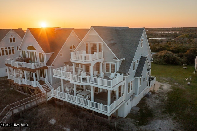 4248 Island Dr, North Topsail Beach, NC 28460 - rear view of property featuring a balcony and roof with shingles
