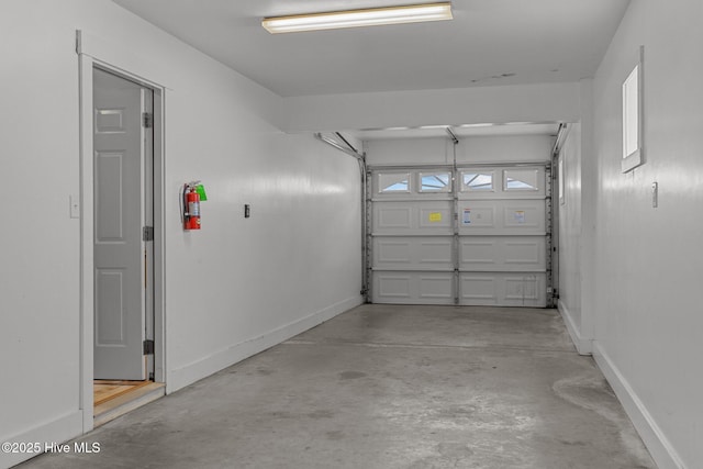 4248 Island Dr, North Topsail Beach, NC 28460 - garage featuring baseboards