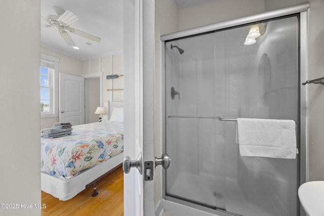 4248 Island Dr, North Topsail Beach, NC 28460 - bathroom featuring a shower stall, wood finished floors, and crown molding