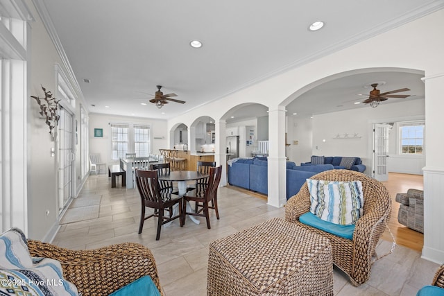 4248 Island Dr, North Topsail Beach, NC 28460 - sunroom / solarium featuring arched walkways, healthy amount of natural light, and french doors