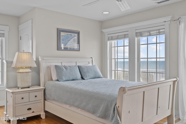 4248 Island Dr, North Topsail Beach, NC 28460 - bedroom featuring dark wood finished floors and recessed lighting
