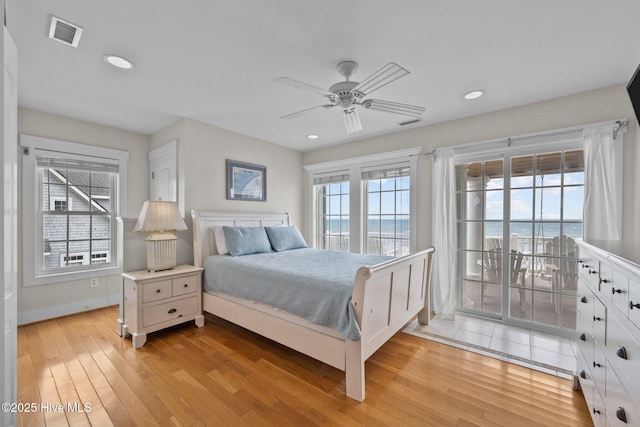 4248 Island Dr, North Topsail Beach, NC 28460 - bedroom featuring light wood-type flooring, access to exterior, recessed lighting, baseboards, and a ceiling fan