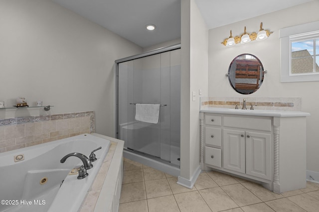 4248 Island Dr, North Topsail Beach, NC 28460 - bathroom featuring a stall shower, vanity, a whirlpool tub, and tile patterned floors
