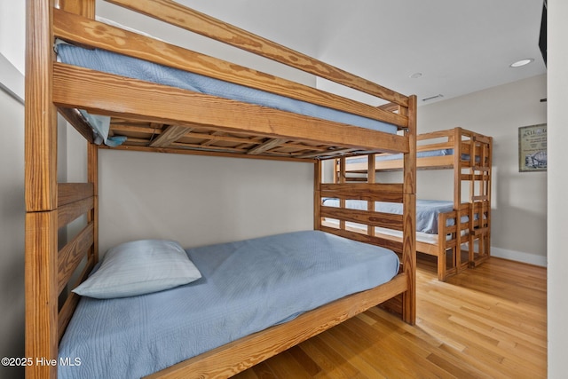 4248 Island Dr, North Topsail Beach, NC 28460 - bedroom featuring wood finished floors