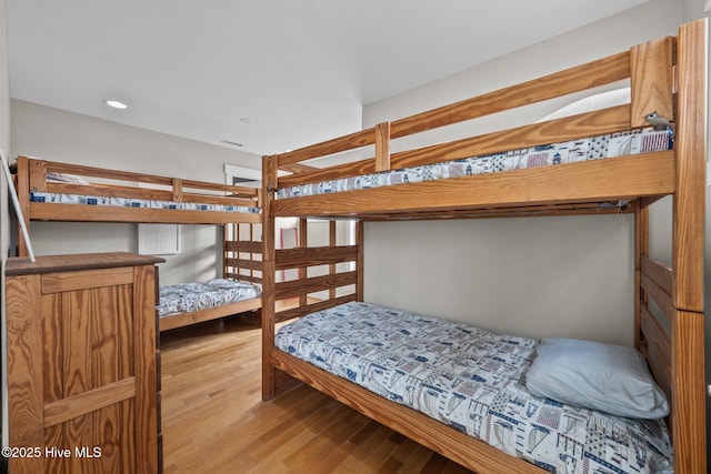 4248 Island Dr, North Topsail Beach, NC 28460 - bedroom featuring wood finished floors