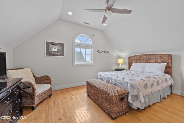 4248 Island Dr, North Topsail Beach, NC 28460 - bedroom featuring light wood-type flooring, baseboards, vaulted ceiling, and a ceiling fan