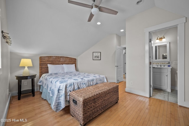 4248 Island Dr, North Topsail Beach, NC 28460 - bedroom with light wood-style flooring, vaulted ceiling, baseboards, ceiling fan, and recessed lighting
