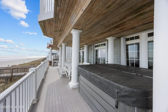 4248 Island Dr, North Topsail Beach, NC 28460 - balcony with view of water and beach and a hot tub