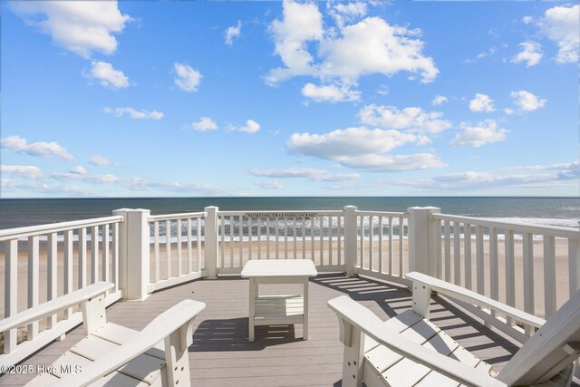 4248 Island Dr, North Topsail Beach, NC 28460 - wooden terrace with a water view
