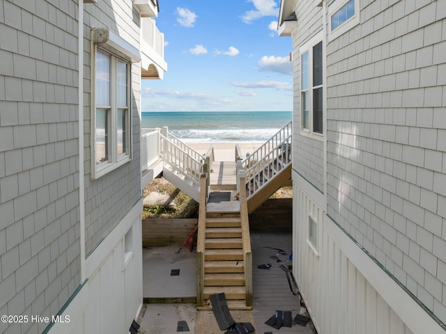 4248 Island Dr, North Topsail Beach, NC 28460 - balcony with stairs and view of water and beach