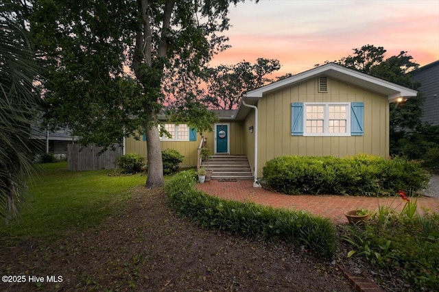 302 Mcglamery St, Oak Island, NC 28465 - view of front of property with board and batten siding