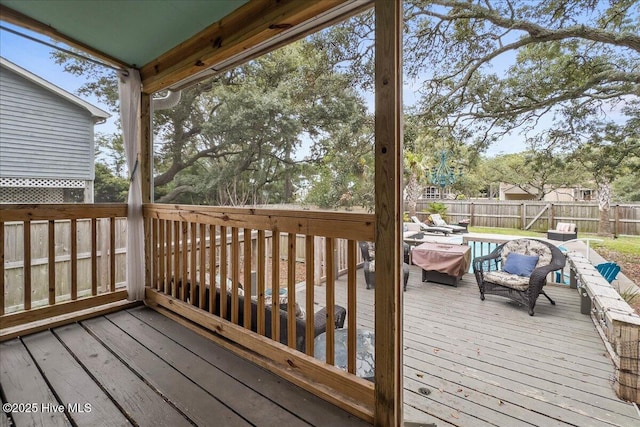 302 Mcglamery St, Oak Island, NC 28465 - deck featuring a fenced backyard