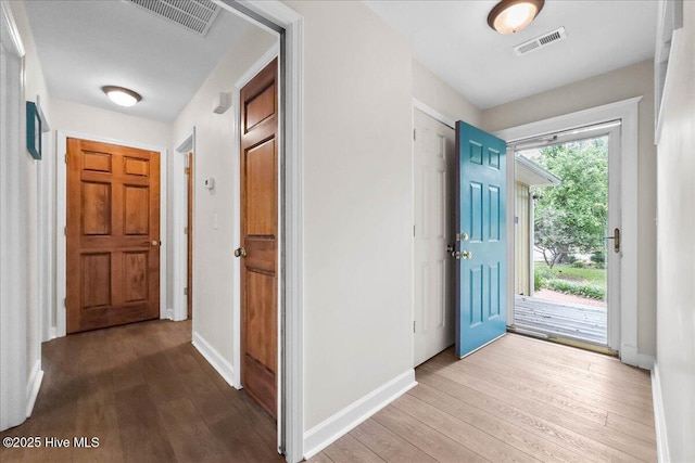 302 Mcglamery St, Oak Island, NC 28465 - entrance foyer featuring hardwood / wood-style floors and baseboards
