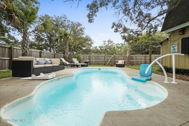 302 Mcglamery St, Oak Island, NC 28465 - view of pool featuring an outdoor living space, a patio, and a fenced backyard