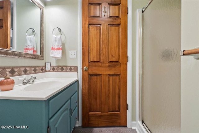 302 Mcglamery St, Oak Island, NC 28465 - bathroom featuring a stall shower and vanity
