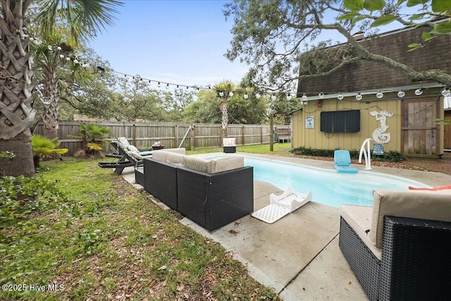 302 Mcglamery St, Oak Island, NC 28465 - view of swimming pool featuring a fenced backyard, outdoor lounge area, an outdoor structure, and a patio area