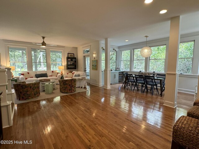 19 Sabal Palm Trl, Bald Head Island, NC 28461 - living room with wood-type flooring, ceiling fan, recessed lighting, and baseboards