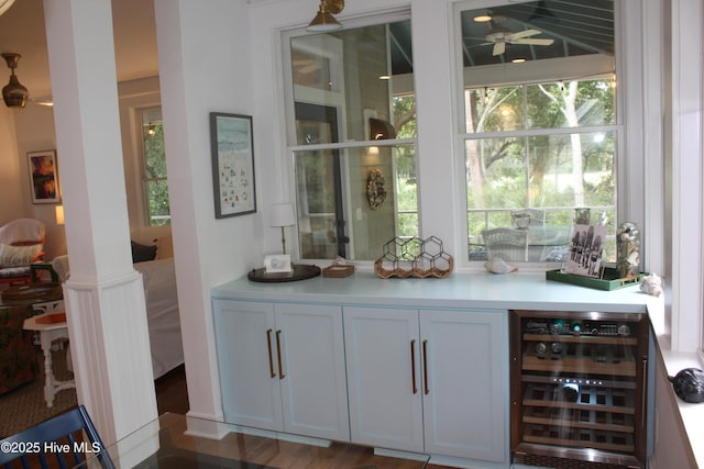 19 Sabal Palm Trl, Bald Head Island, NC 28461 - indoor dry bar featuring wine cooler and ceiling fan