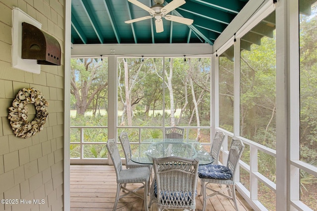 19 Sabal Palm Trl, Bald Head Island, NC 28461 - sunroom featuring ceiling fan and outdoor dining space