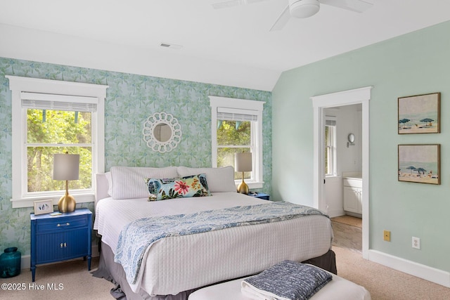 19 Sabal Palm Trl, Bald Head Island, NC 28461 - bedroom with wallpapered walls, carpet flooring, connected bathroom, a ceiling fan, and lofted ceiling