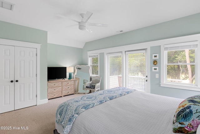 19 Sabal Palm Trl, Bald Head Island, NC 28461 - bedroom with carpet, multiple windows, access to exterior, and a ceiling fan
