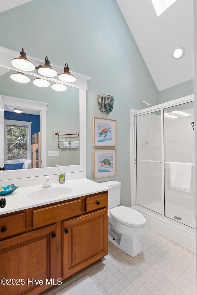 19 Sabal Palm Trl, Bald Head Island, NC 28461 - bathroom with vanity, a stall shower, toilet, and high vaulted ceiling