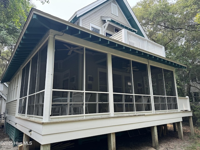 19 Sabal Palm Trl, Bald Head Island, NC 28461 - view of side of property featuring a sunroom