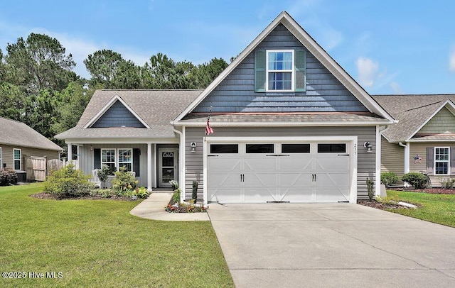 235 Chambers St, Winnabow, NC 28479 - craftsman inspired home with driveway, a front lawn, central AC unit, and a shingled roof