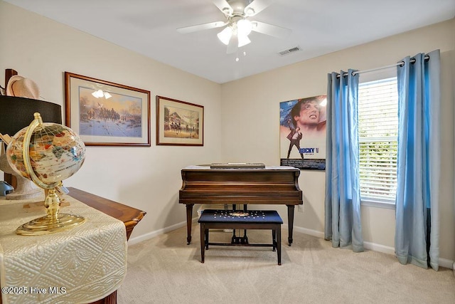 235 Chambers St, Winnabow, NC 28479 - living area with ceiling fan, light colored carpet, healthy amount of natural light, and baseboards