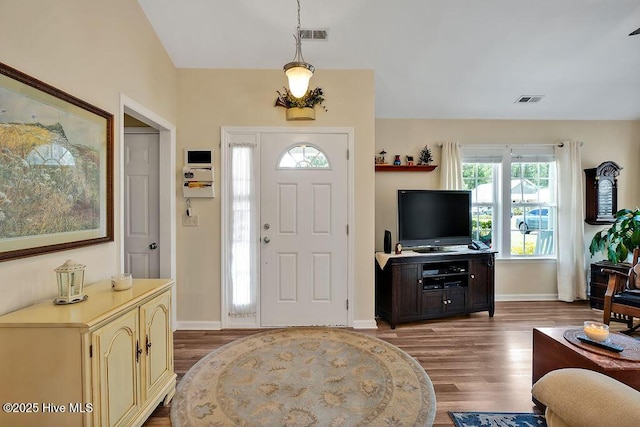 235 Chambers St, Winnabow, NC 28479 - entryway with wood finished floors and baseboards
