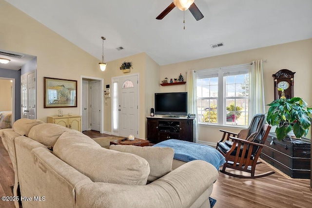 235 Chambers St, Winnabow, NC 28479 - living room featuring ceiling fan, wood finished floors, vaulted ceiling, and baseboards