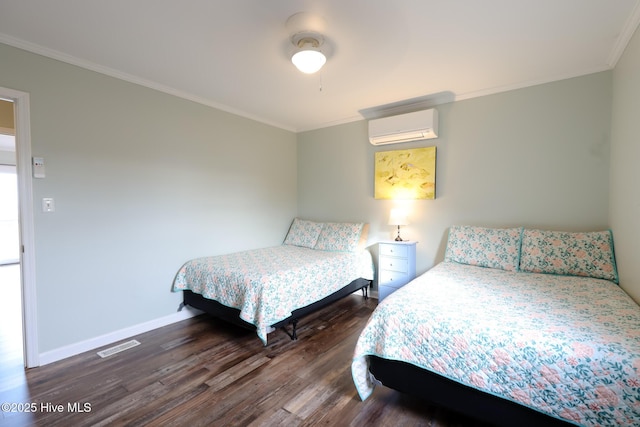 1116 E Ft Macon Rd, Atlantic Beach, NC 28512 - bedroom featuring a wall unit AC, ornamental molding, dark wood-style flooring, and baseboards