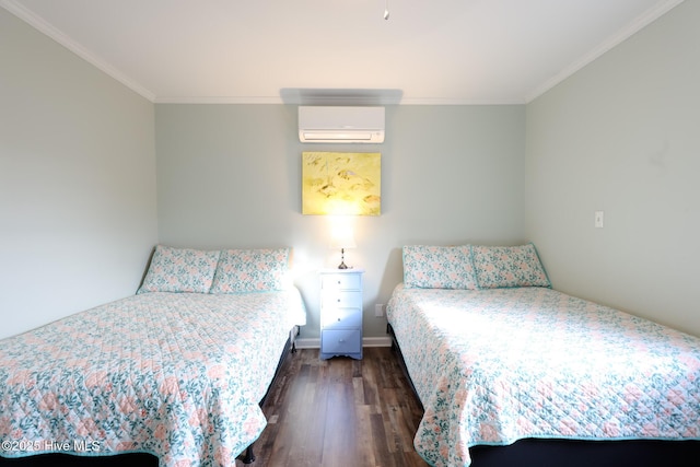 1116 E Ft Macon Rd, Atlantic Beach, NC 28512 - bedroom with a wall unit AC, ornamental molding, dark wood-style floors, and baseboards