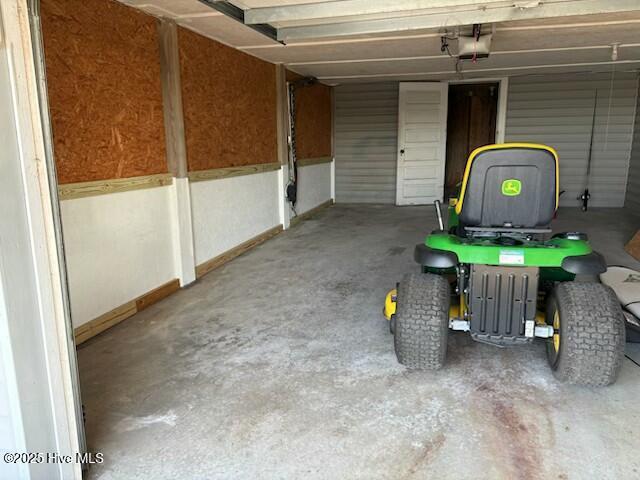 1116 E Ft Macon Rd, Atlantic Beach, NC 28512 - garage featuring a garage door opener