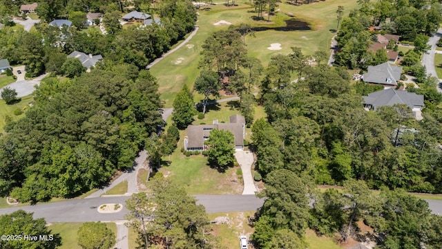 304 Lord Granville Dr, Morehead City, NC 28557 - aerial overview of property's location with a local golf course, a tree filled landscape, and nearby suburban area