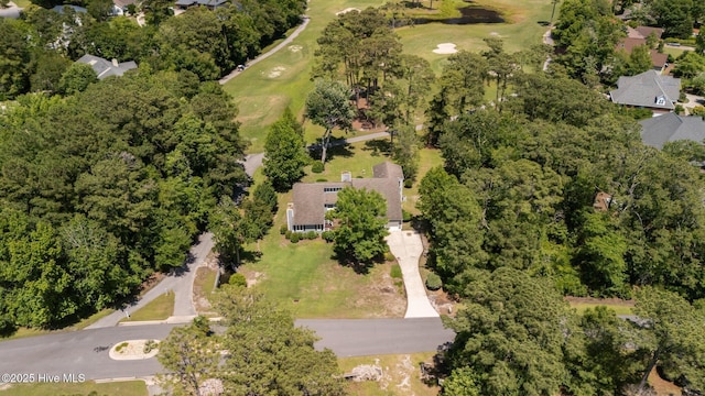 304 Lord Granville Dr, Morehead City, NC 28557 - aerial overview of property's location featuring a golf club, nearby suburban area, and a tree filled landscape