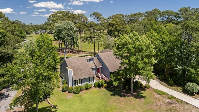 304 Lord Granville Dr, Morehead City, NC 28557 - aerial view of property and surrounding area with a tree filled landscape