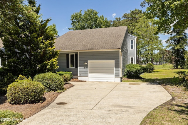 304 Lord Granville Dr, Morehead City, NC 28557 - view of front facade featuring a front yard and driveway