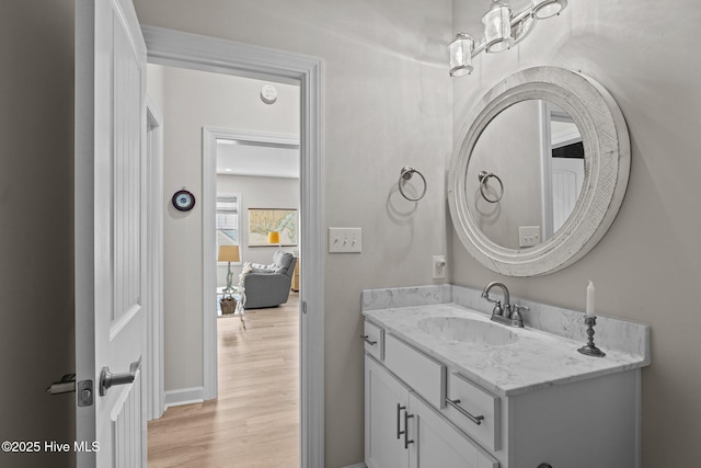 104 S 30th St, Morehead City, NC 28557 - bathroom featuring wood finished floors, vanity, and baseboards