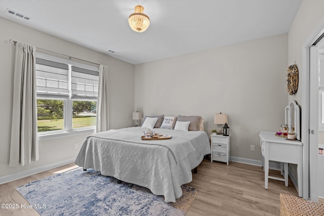 104 S 30th St, Morehead City, NC 28557 - bedroom with light wood-style floors and baseboards