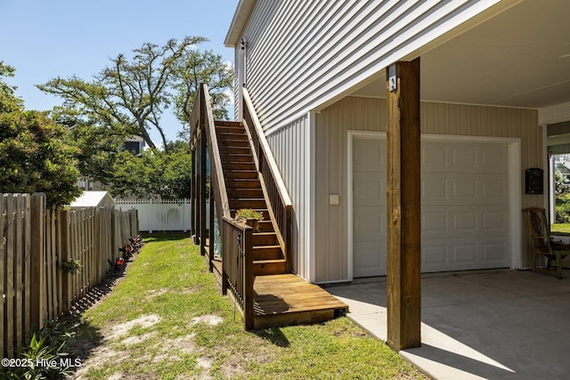 104 S 30th St, Morehead City, NC 28557 - view of yard featuring stairway and concrete driveway